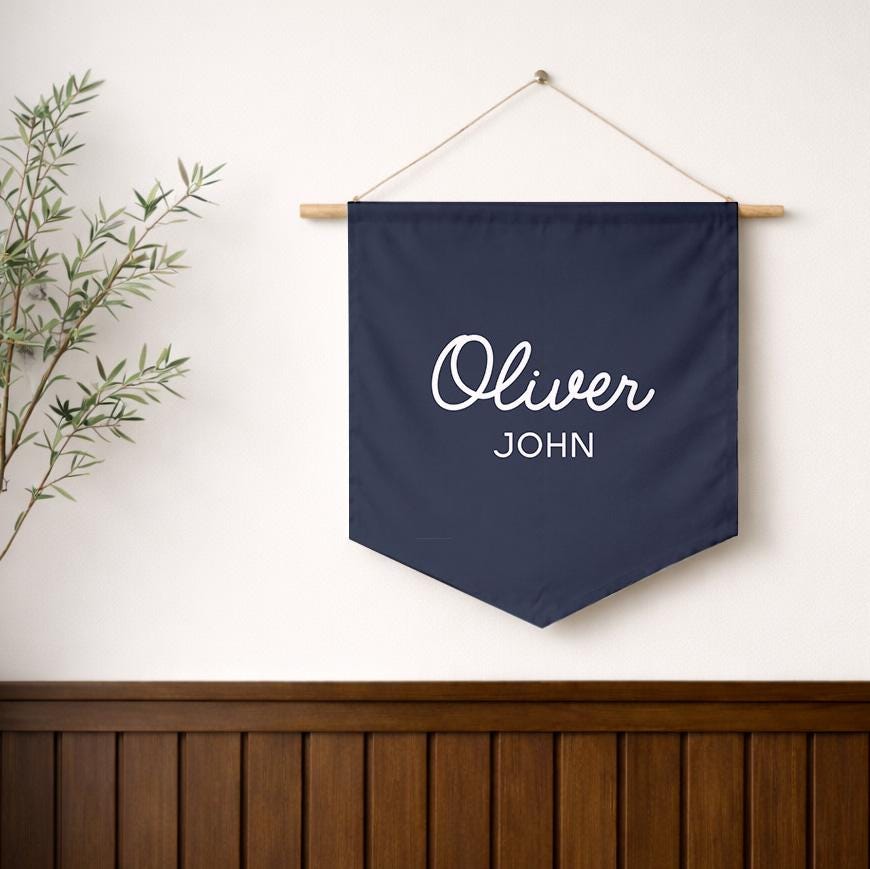 Navy modern script name pennant with Oliver John in white